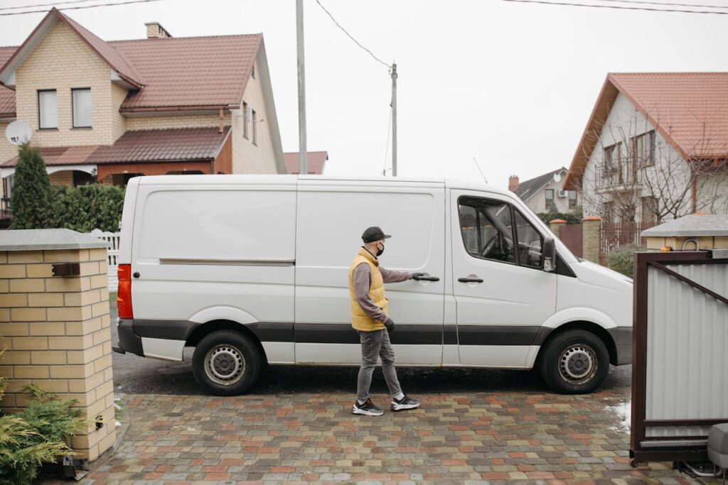 Man Opening a Delivery Van